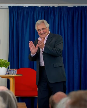 John Suchet clapping